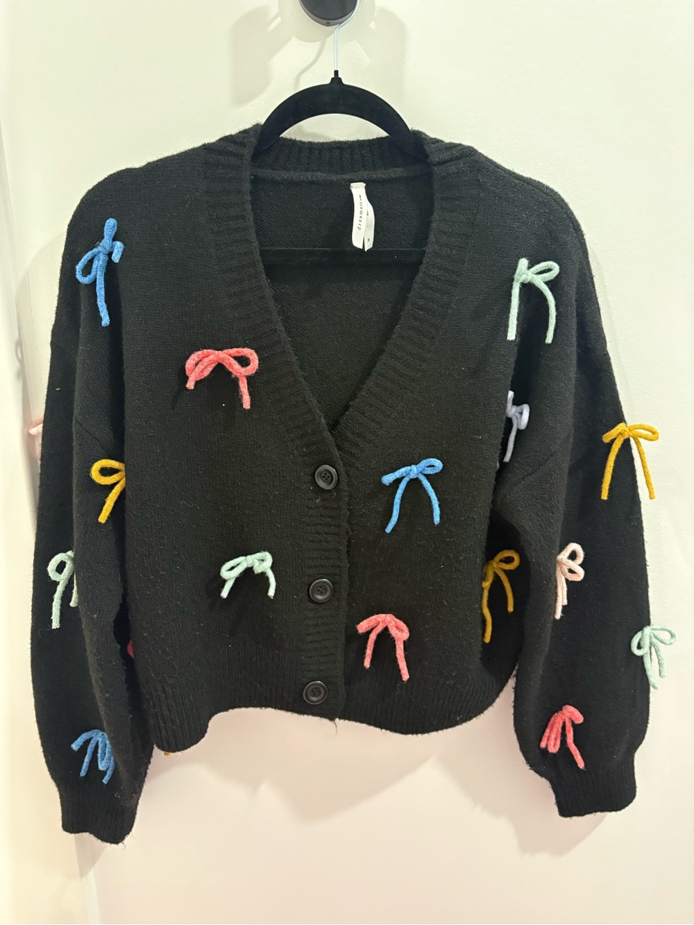 Black V-Neck Cardigan with Multicolor Bow Accents